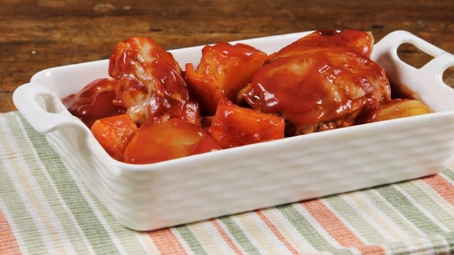 chicken menudo in a rectangular ceramic bowl