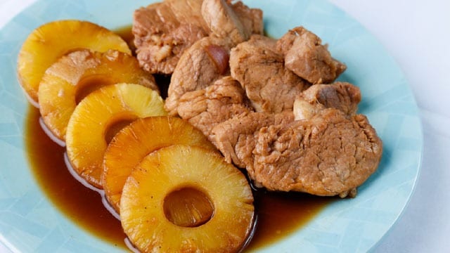 pork hamonado with pineapple slices on the side