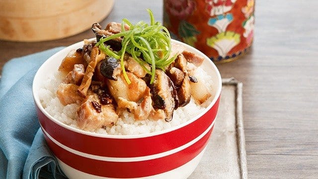 chinese steamed spareribs with tausi, topped with green onion and served over rice