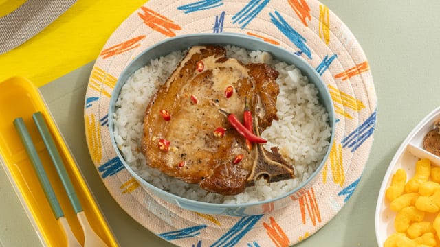 bicol express pork chops in a lunch box