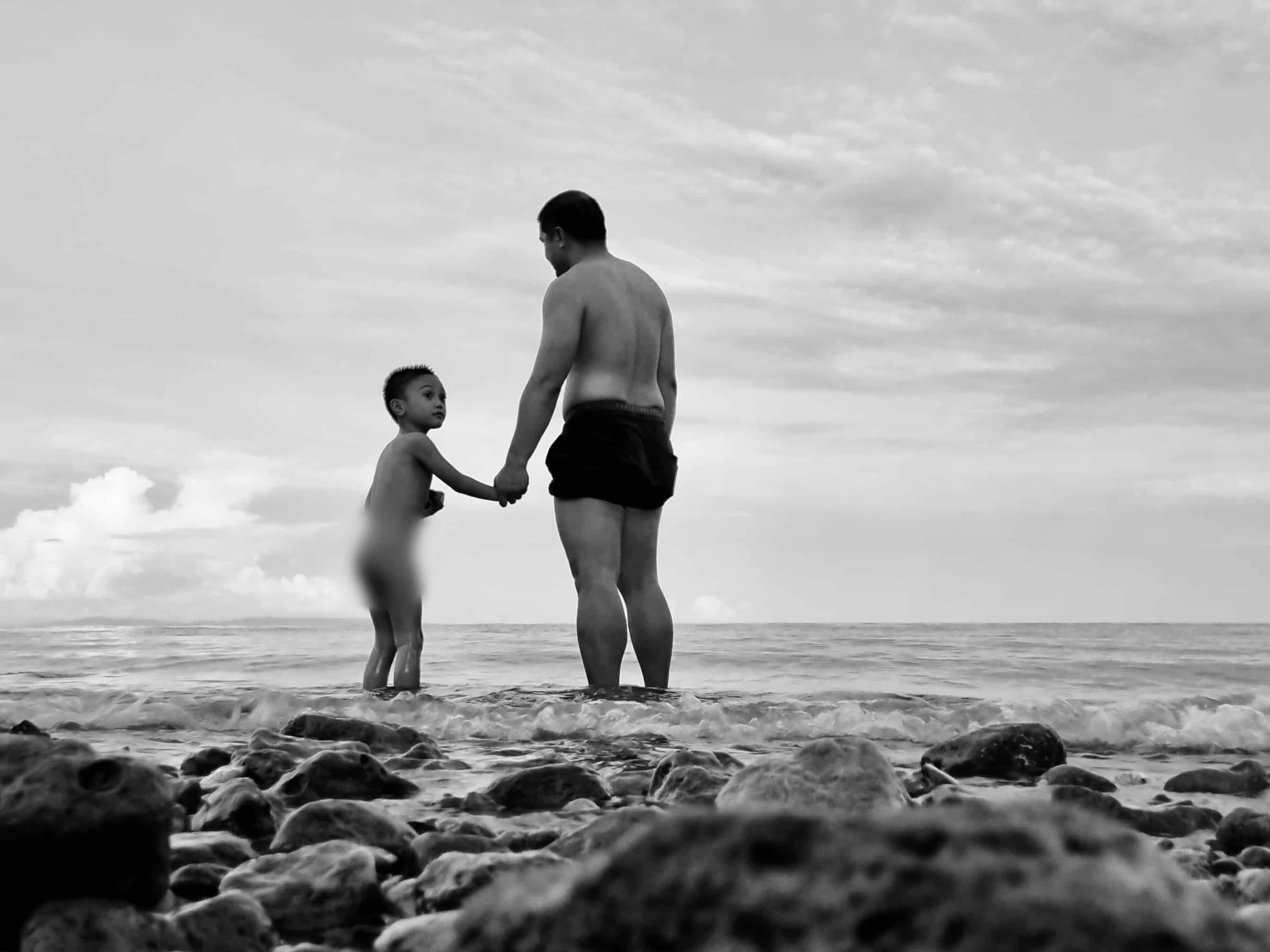Richard and his son at the beach