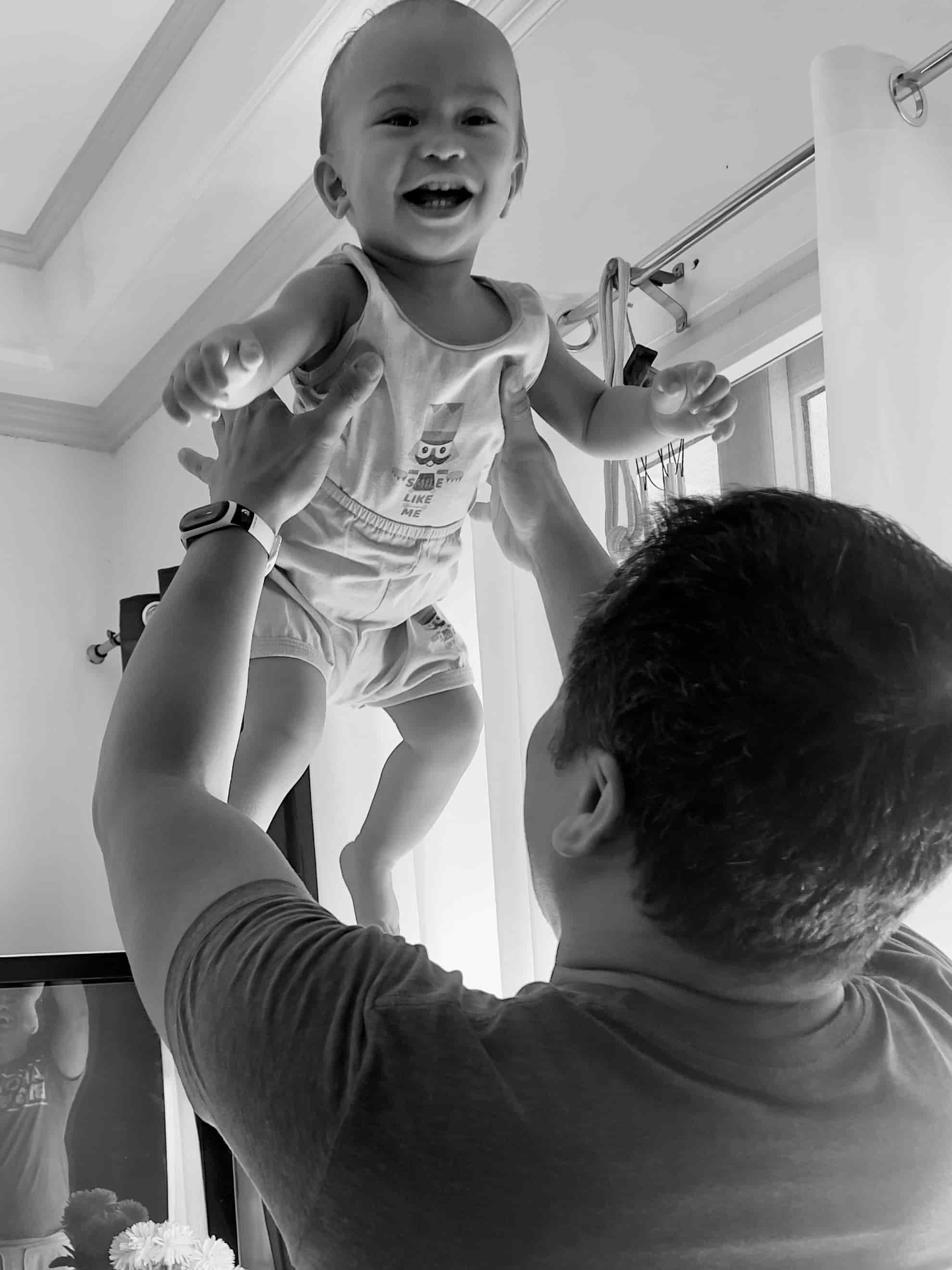 Richard playing with his son