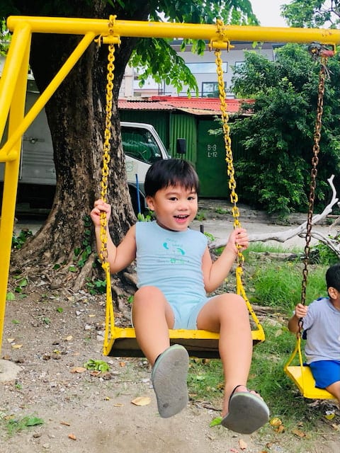 CHILD ON A SWING