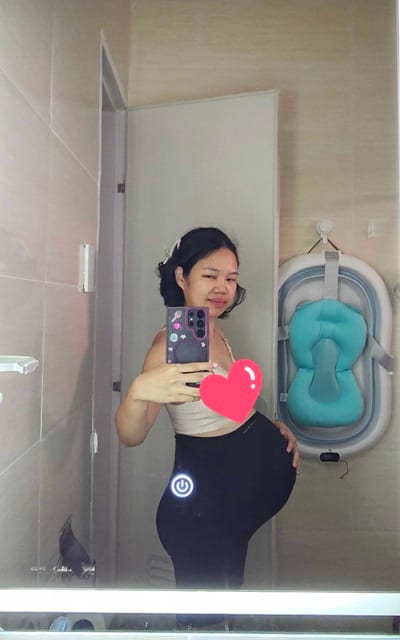 the author wearing the mommabare maternity shorts
