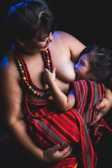 mom breastfeeding her child