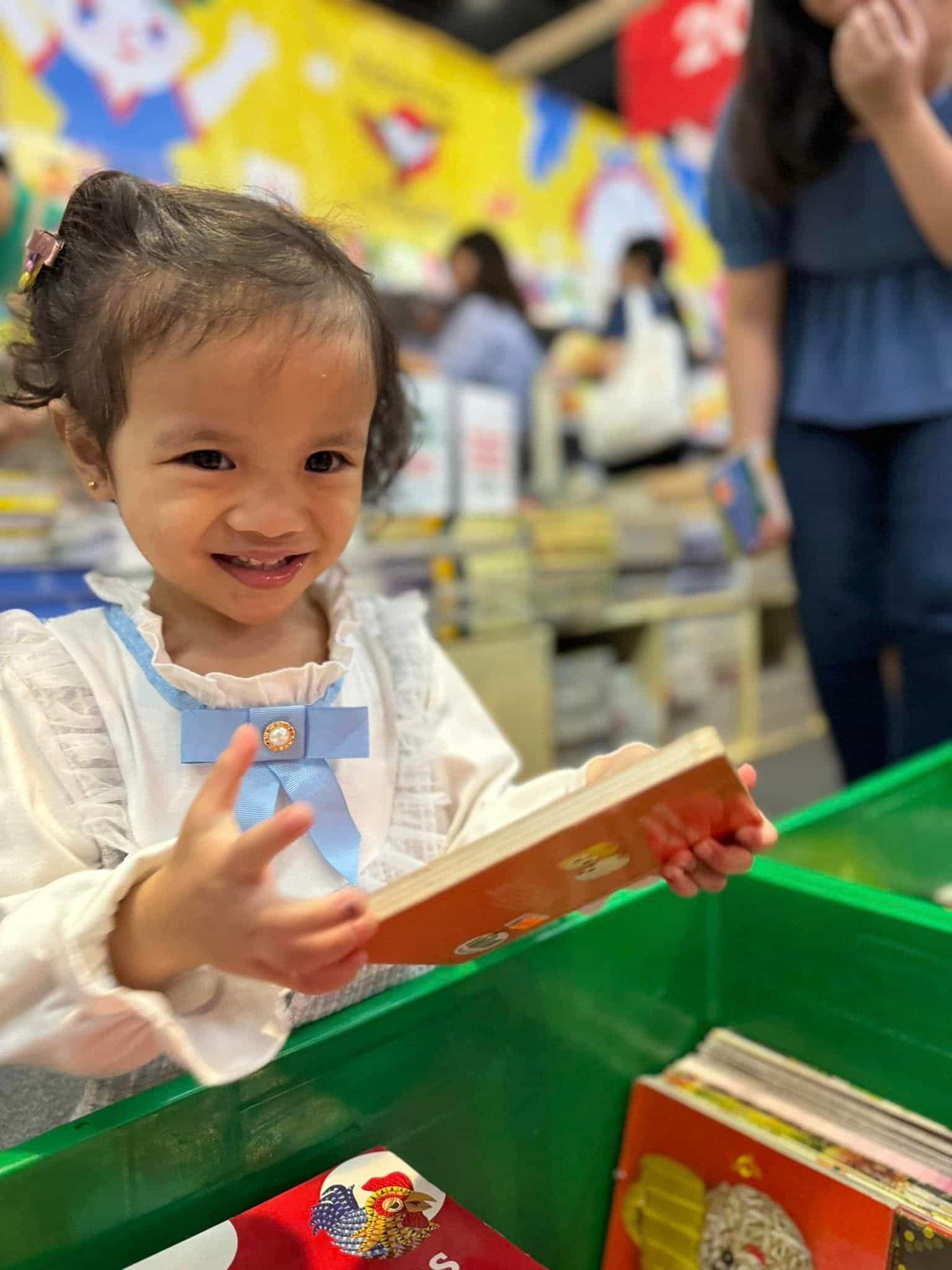 Author's daughter at the Manila International Book Fair