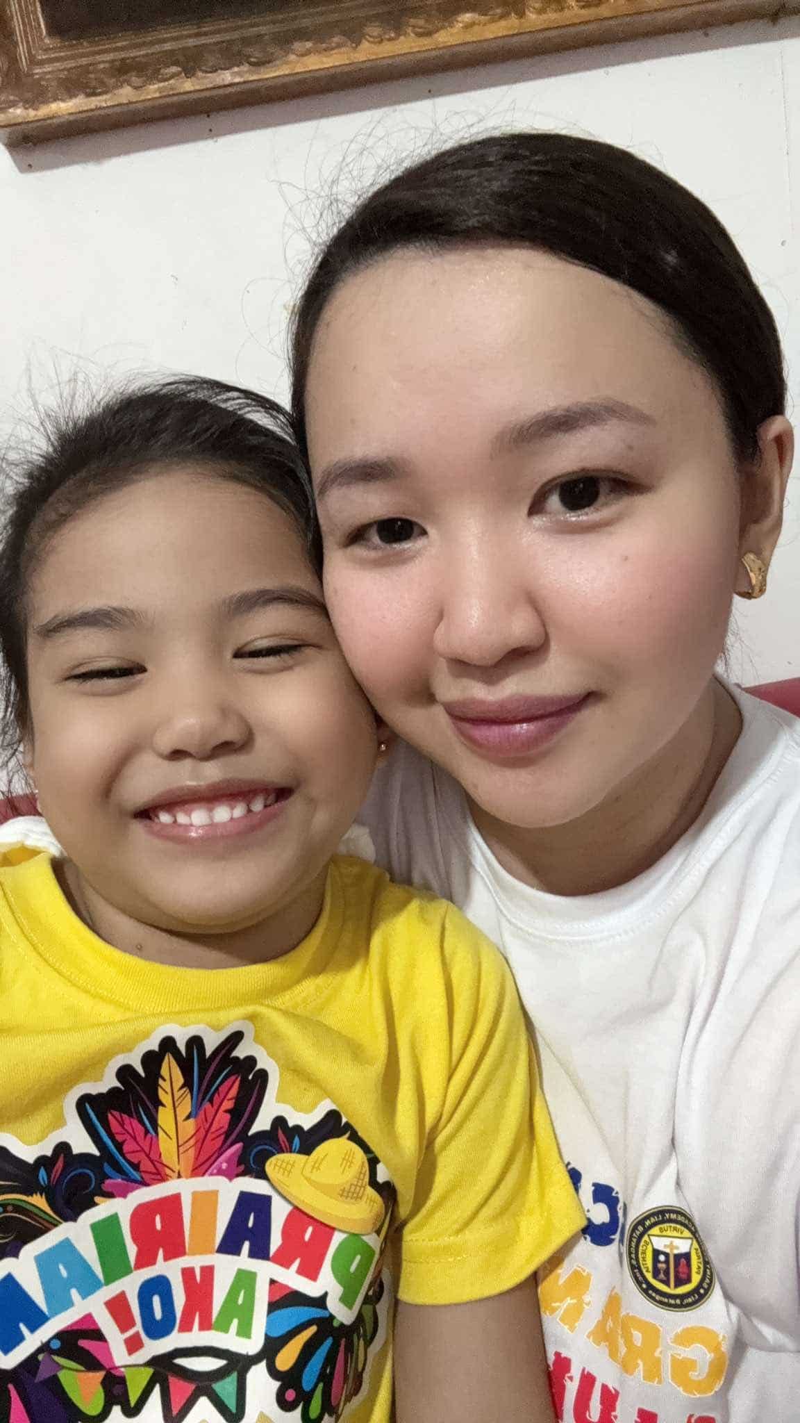 Kamille Avila and child