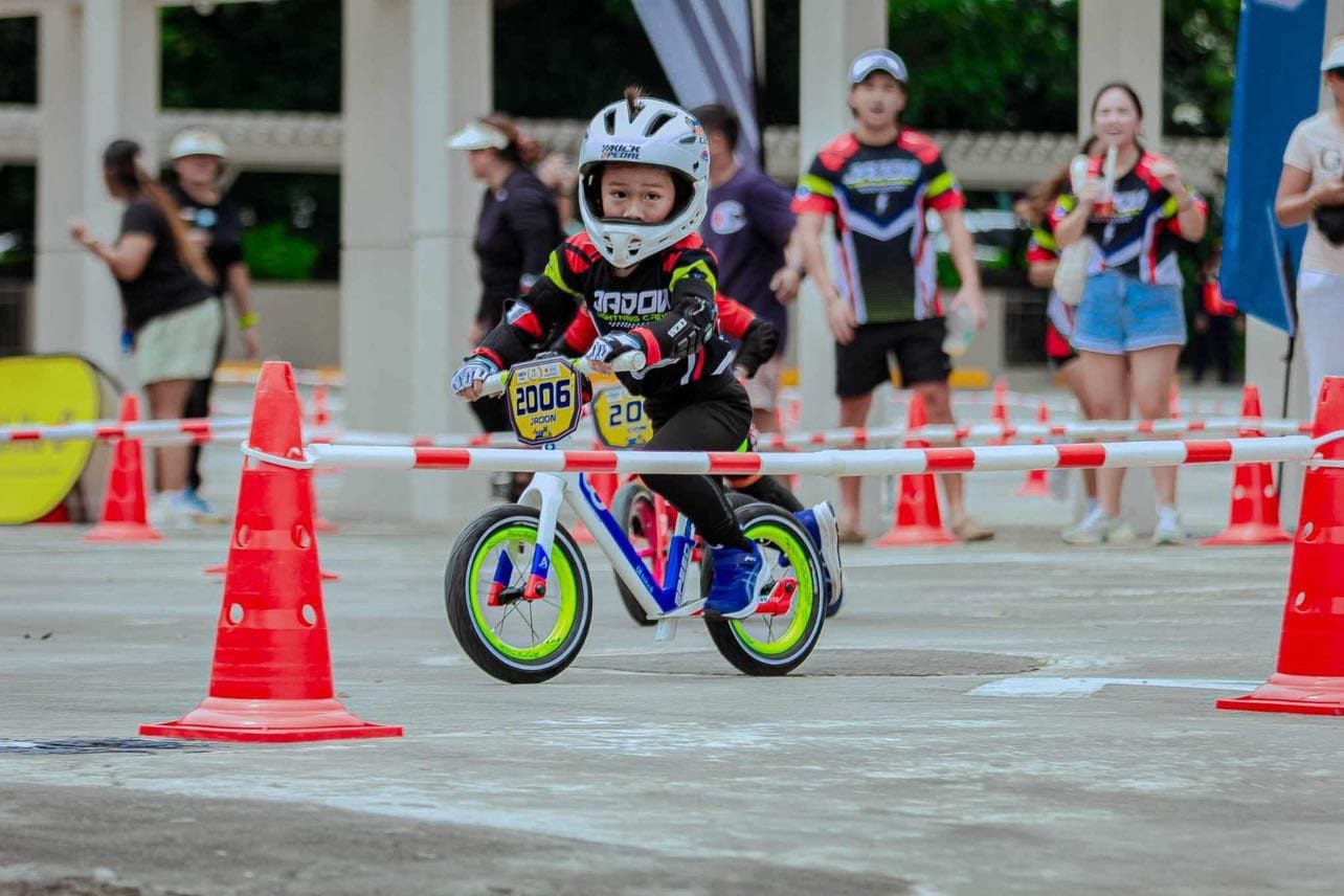 Jadon Malakai on his pushbike