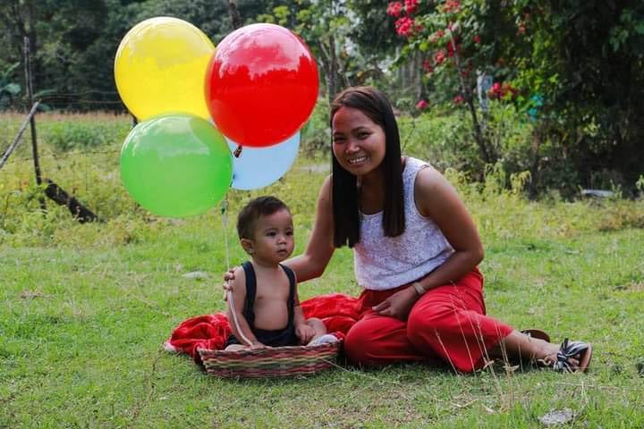Jenny Jacinto-Aquino and child