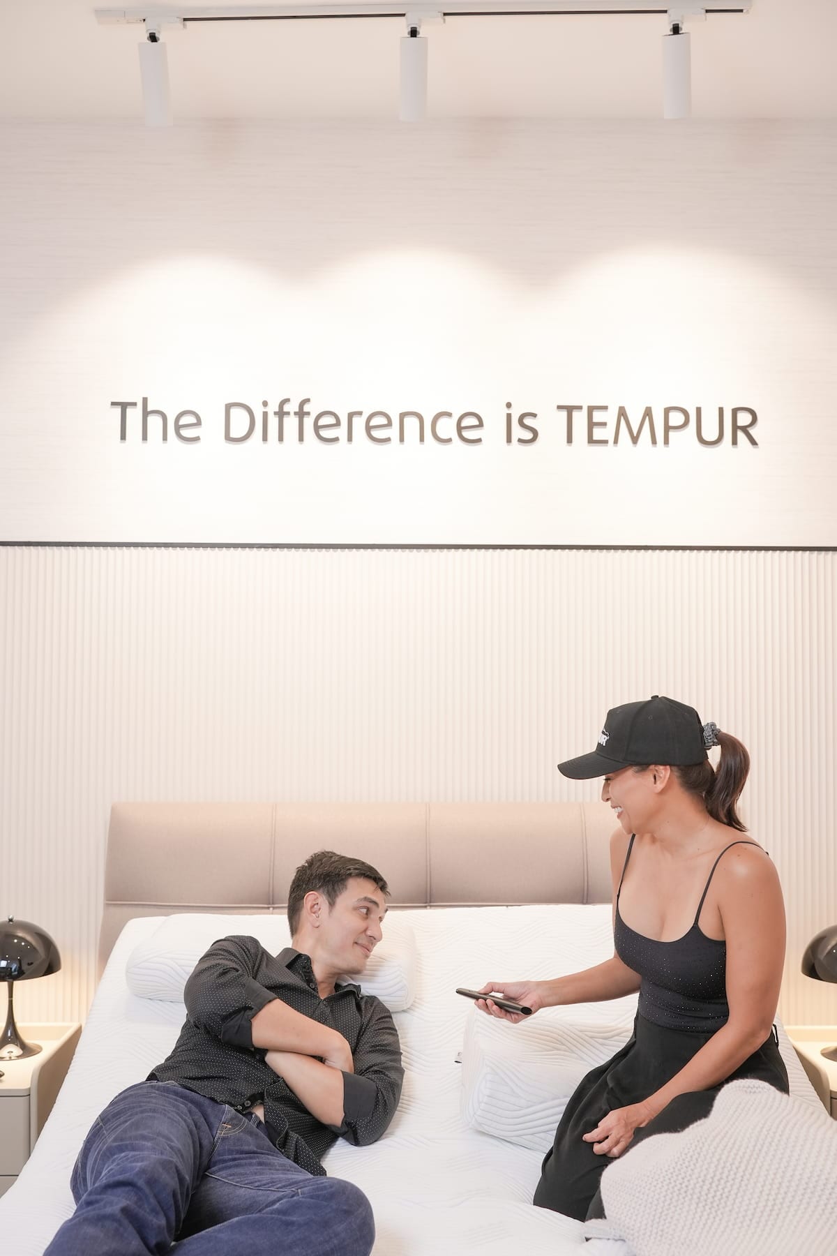 Couple tries a bed mattress