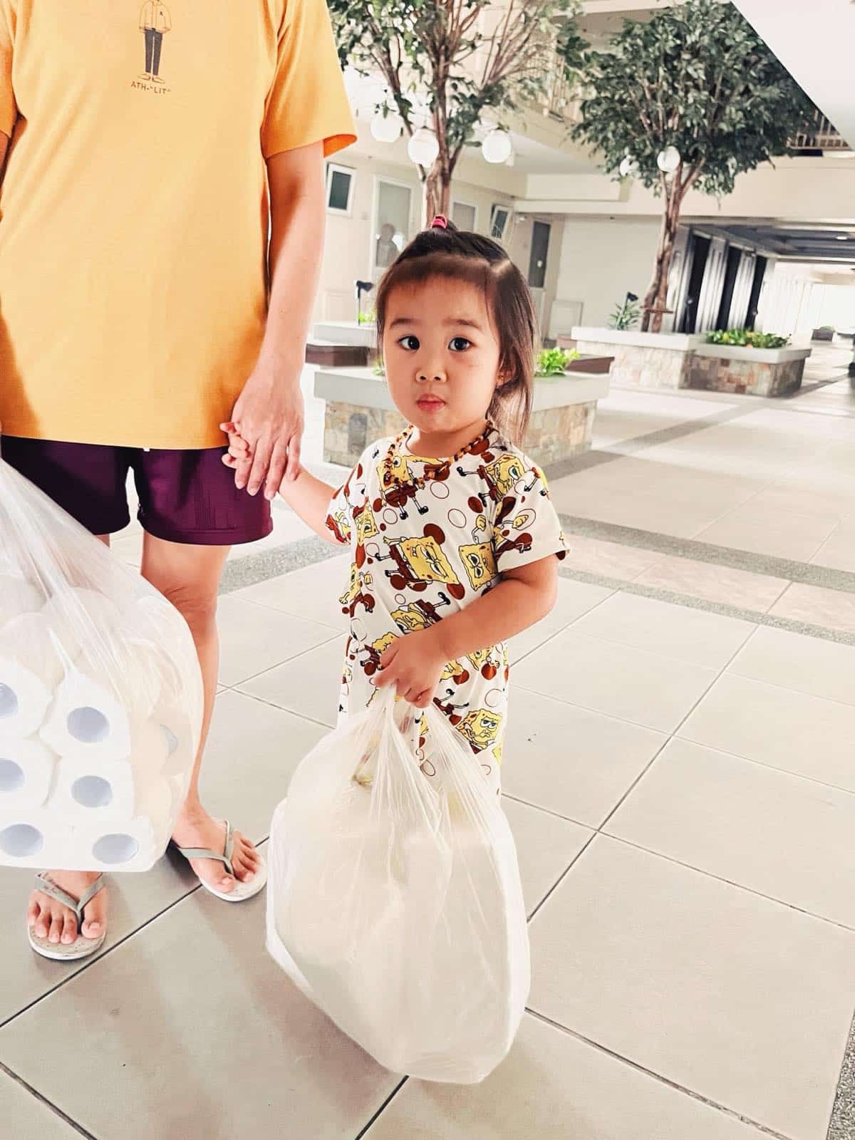 Anika helping out in their business