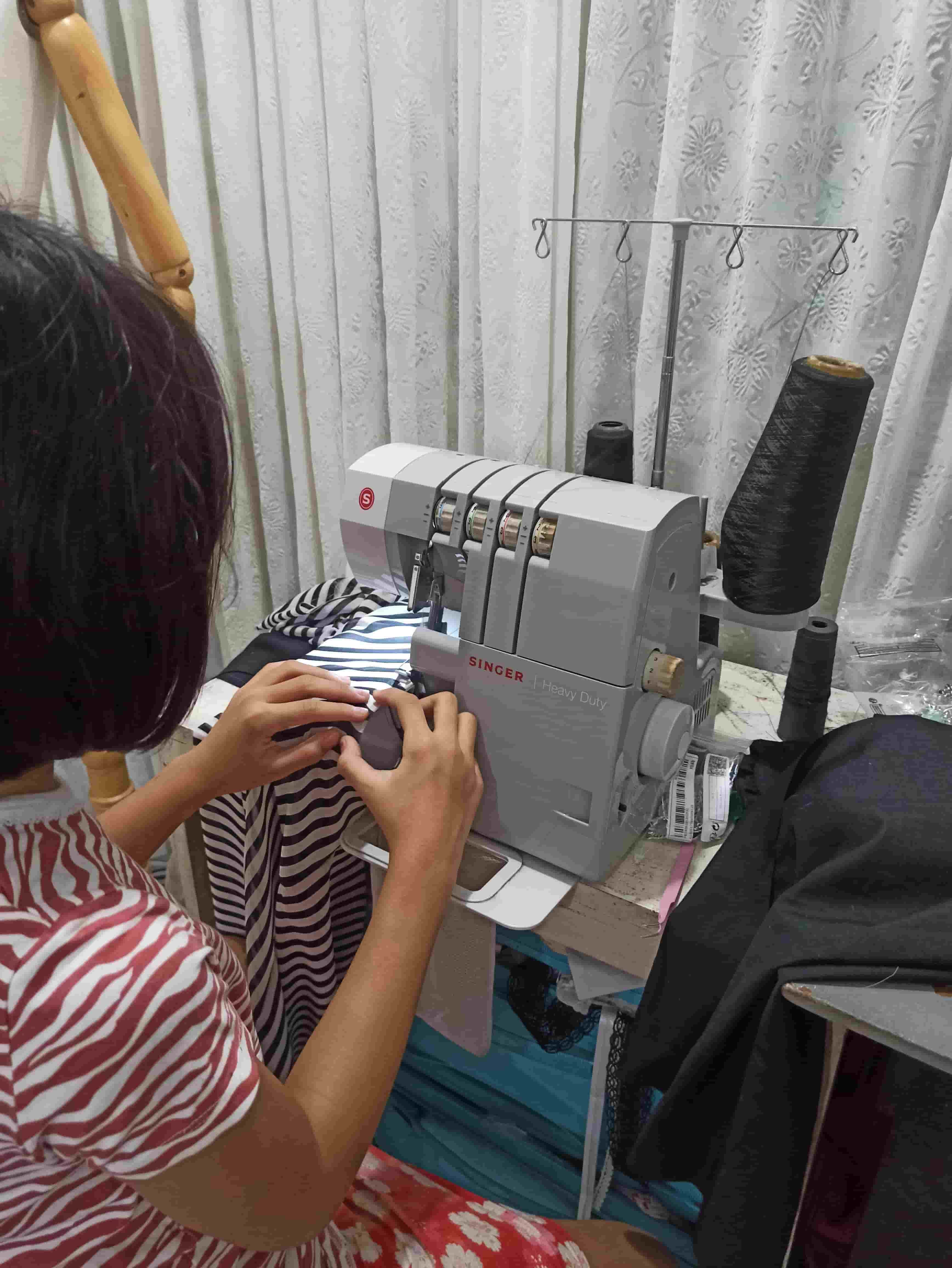 Beau on her sewing machine