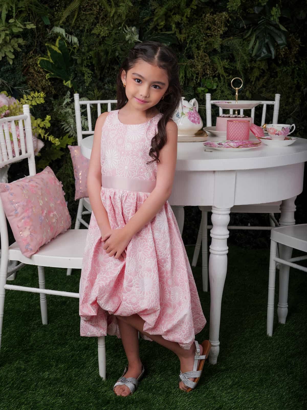 Young girl in a pink dress