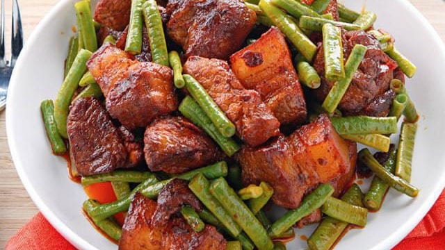 Adobo de campesino - braised pork belly chunks with sitaw in a bowl