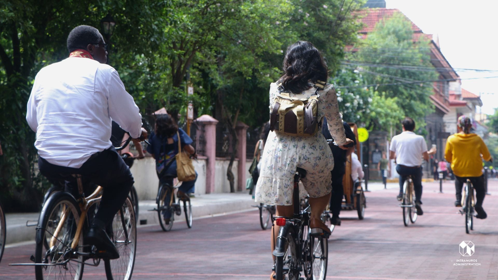 Cyclists along the roads of Intramuros.