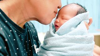 Don't Be Afraid to Ask Guests to Stop Kissing Your Newborn