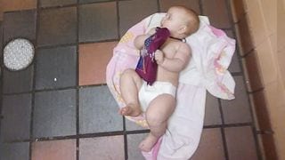 Father's Post About Changing His Daughter on Bathroom Floor Goes Viral