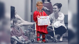 Boy With Spina Bifida Walks to Collect Diploma at Preschool Graduation