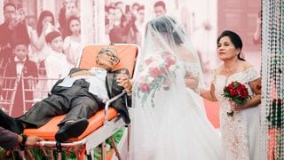 Gravely Ill Father 'Walks' Daughter Down the Aisle on Her Wedding Day